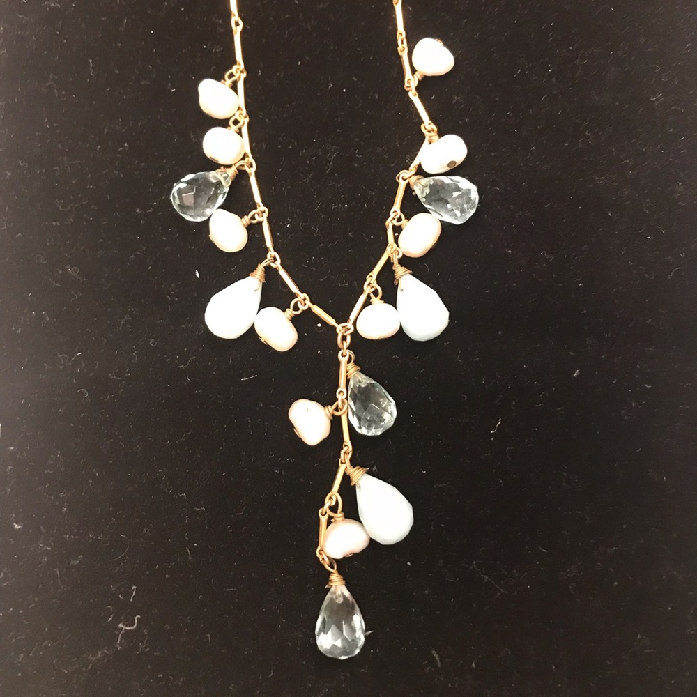 Light sea blue and white stones on gold chain
